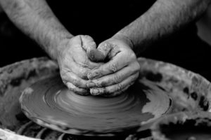 hands on pottery wheel